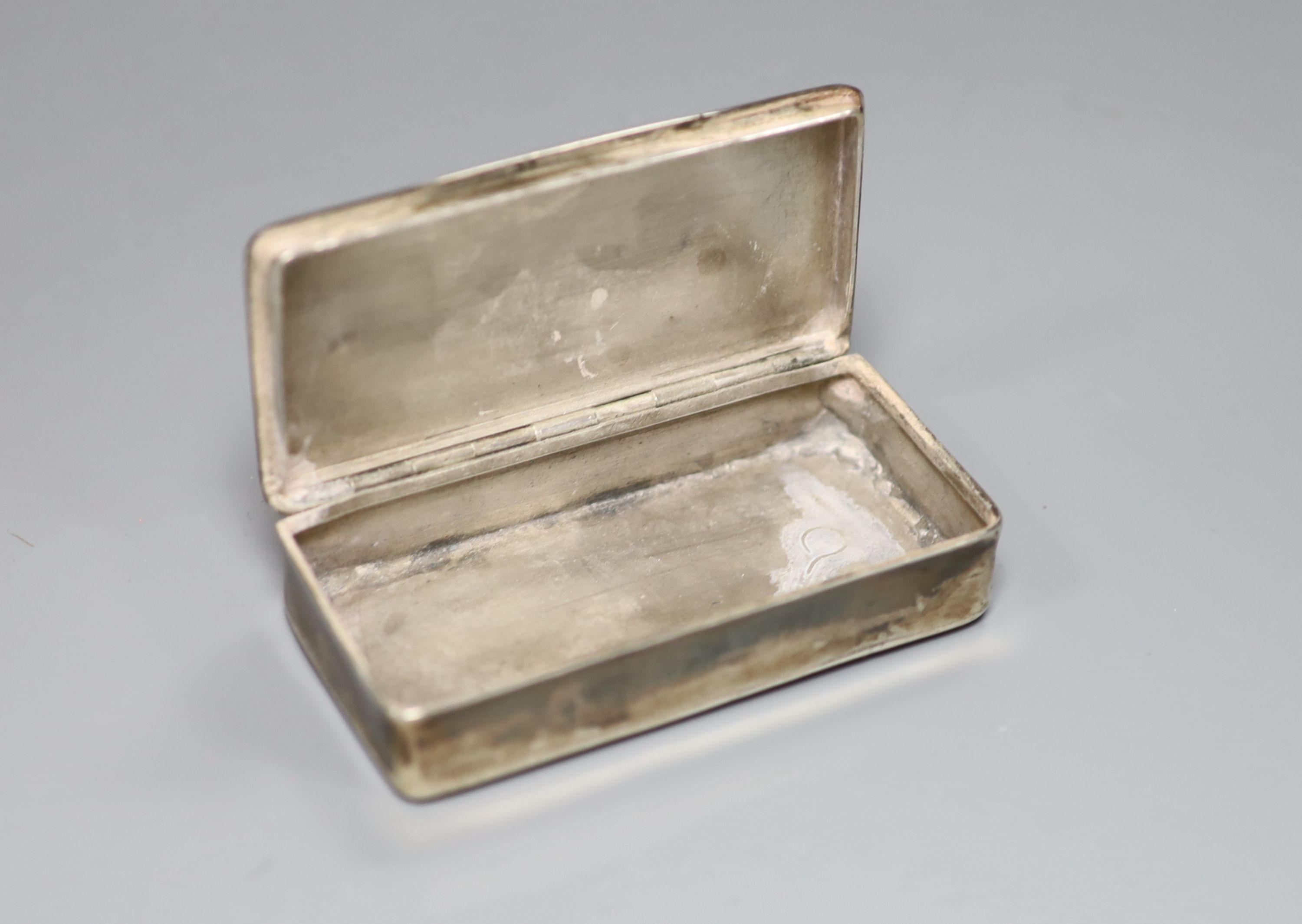 A 19th century continental white metal rectangular snuff box (a.f.)